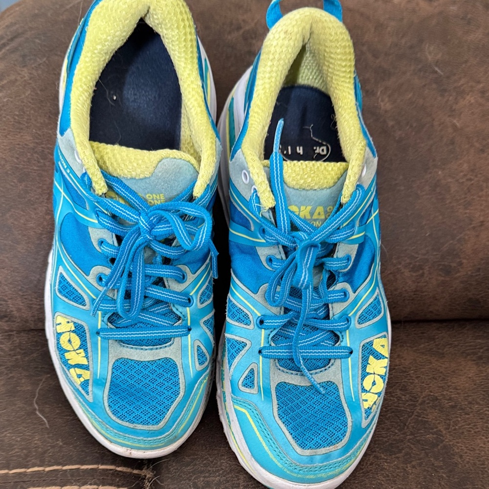 Hoka womans Vibrant Blue and Yellow Sneakers